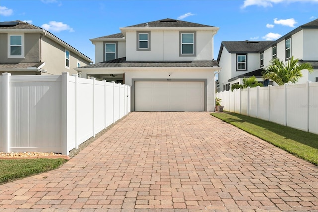 view of front of property featuring a garage