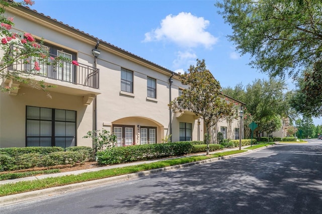 701 Westpark Way Unit 202, Celebration, FL 34747 - view of property exterior featuring stucco siding