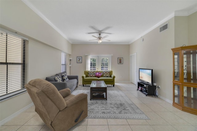 living room with light tile patterned flooring and ornamental molding