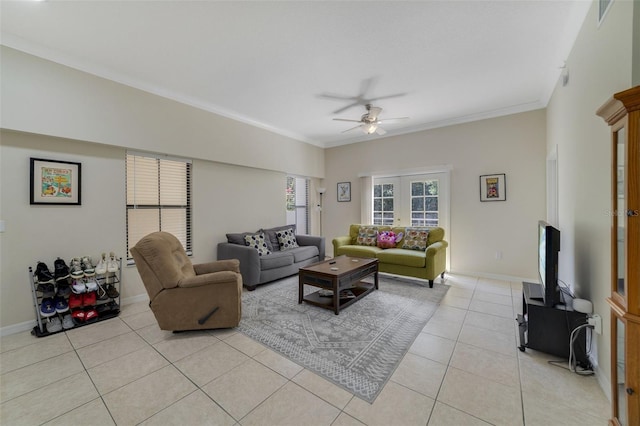 701 Westpark Way Unit 202, Celebration, FL 34747 - living area with ornamental molding, light tile patterned flooring, and a ceiling fan