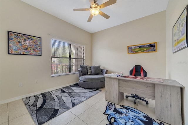 office area with ceiling fan and light tile patterned floors