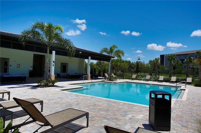 view of swimming pool featuring a patio