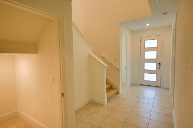 foyer featuring light tile patterned floors