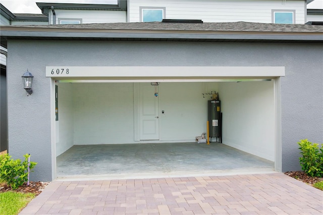 garage featuring water heater