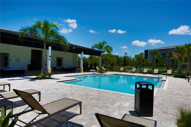 view of swimming pool featuring a patio