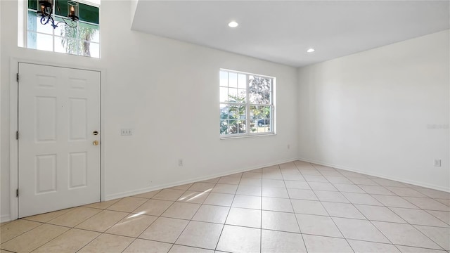 entrance foyer with light tile patterned flooring