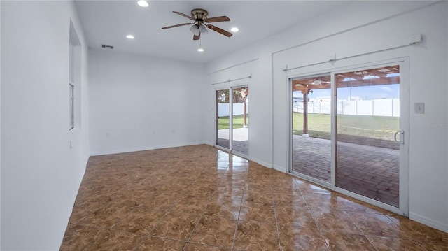 spare room featuring ceiling fan