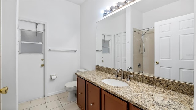 full bathroom with tile patterned floors, vanity, toilet, and shower / bath combination