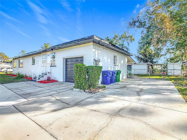 view of home's exterior with a garage