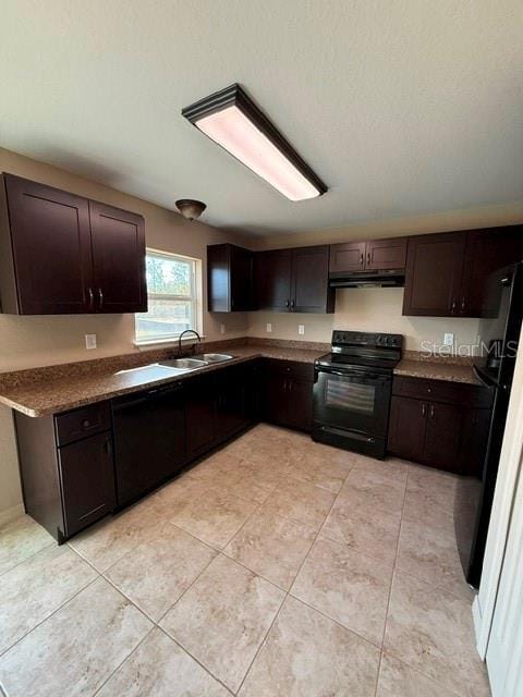 kitchen featuring dark brown cabinetry, black electric range oven, and sink