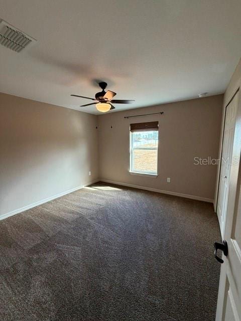 unfurnished room featuring carpet flooring and ceiling fan