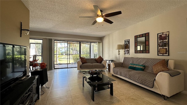 tiled living room featuring a textured ceiling and ceiling fan