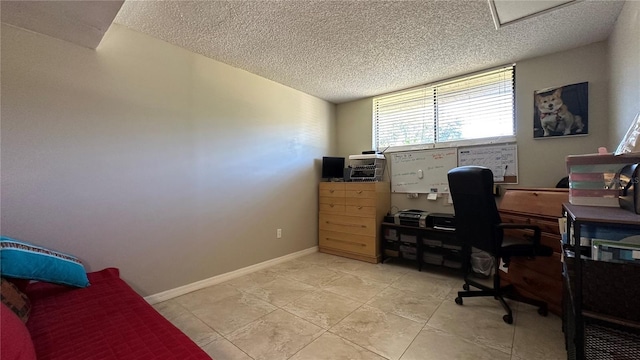 tiled office with a textured ceiling