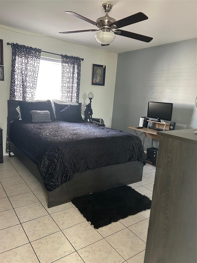 bedroom featuring ceiling fan and light tile patterned floors