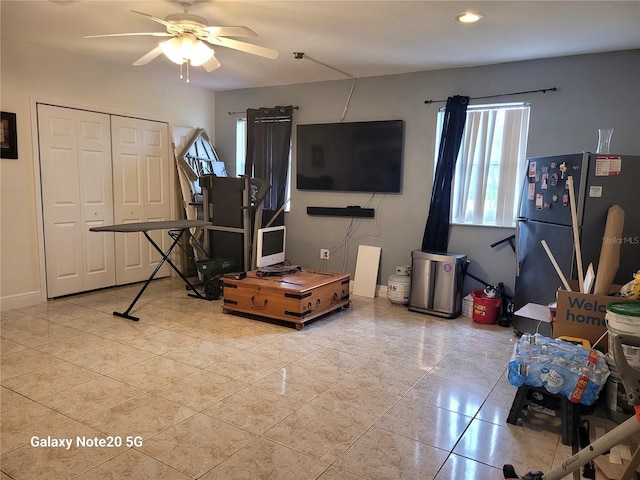 living room featuring ceiling fan