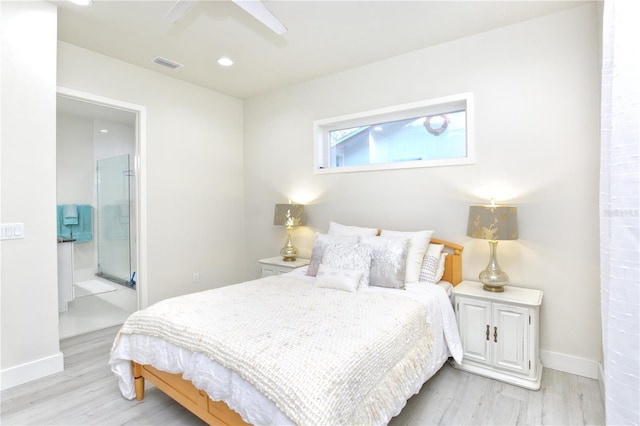 bedroom with connected bathroom, ceiling fan, and light wood-type flooring