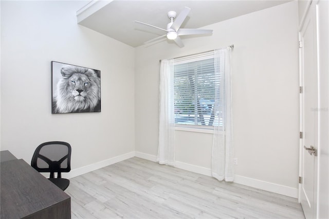 office with ceiling fan and light hardwood / wood-style floors