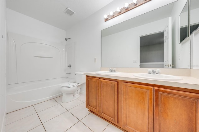 full bathroom with toilet, tile patterned flooring, vanity, and washtub / shower combination