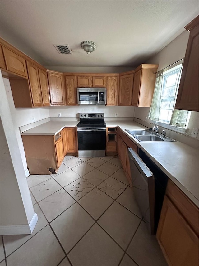 kitchen with sink and stainless steel appliances