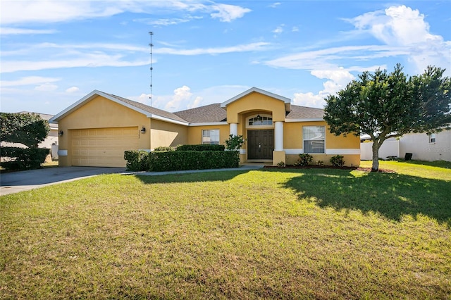 ranch-style home with a garage and a front lawn