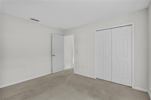 3362 Winchester Estates Cir, Lakeland, FL 33810 - unfurnished bedroom featuring carpet flooring and a closet