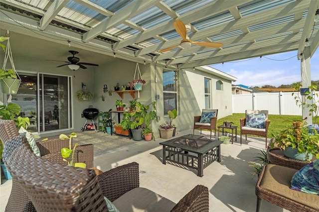 view of patio / terrace featuring area for grilling and ceiling fan