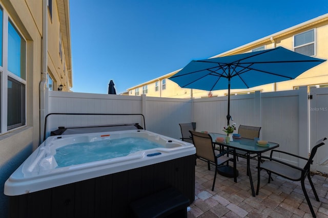 view of patio featuring a hot tub