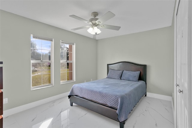 bedroom featuring ceiling fan