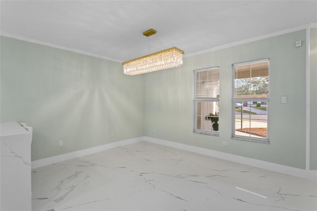 empty room featuring ornamental molding and an inviting chandelier