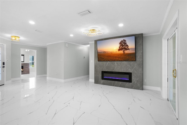 living room with a fireplace and ornamental molding