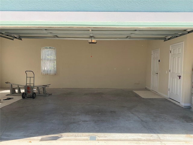 garage featuring a garage door opener