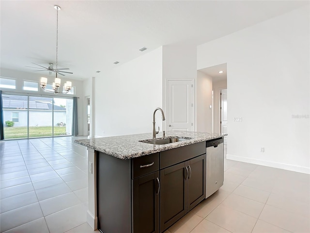 kitchen featuring ceiling fan, sink, stainless steel dishwasher, a kitchen island with sink, and light tile patterned floors