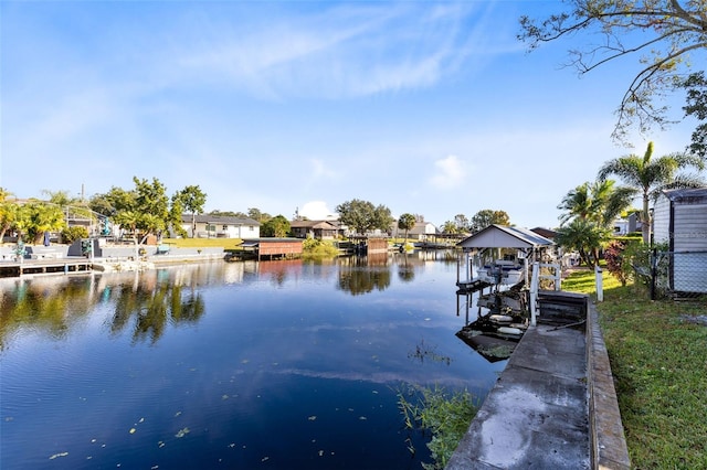 2545 Harris Blvd, Kissimmee, FL 34746 - dock featuring boat lift, a water view, and a residential view
