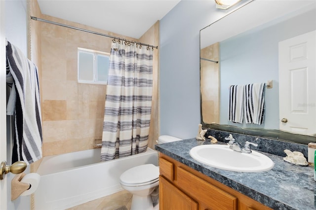 full bathroom with tile patterned flooring, vanity, toilet, and shower / bath combo with shower curtain