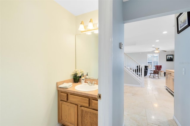 bathroom with vanity and ceiling fan