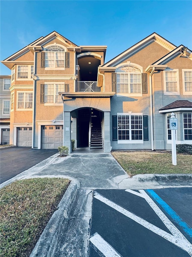 view of property featuring a balcony