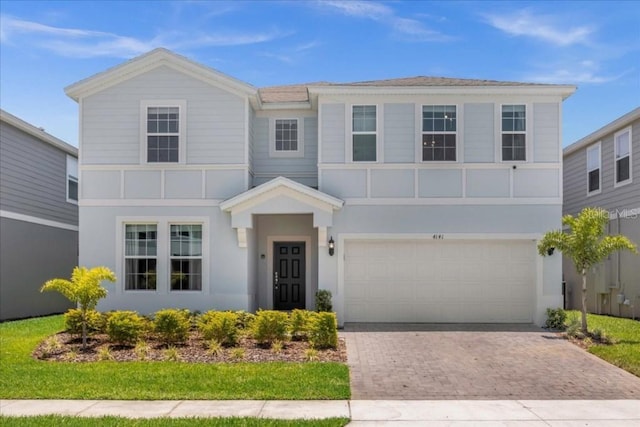 view of front of property with a garage