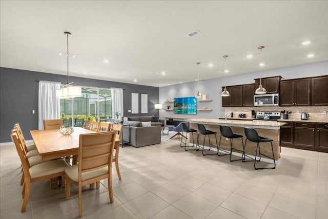 dining room with light tile patterned floors