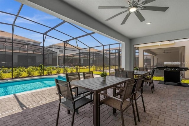 view of patio featuring a grill and a lanai