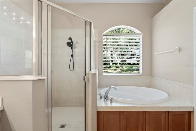 bathroom featuring plus walk in shower