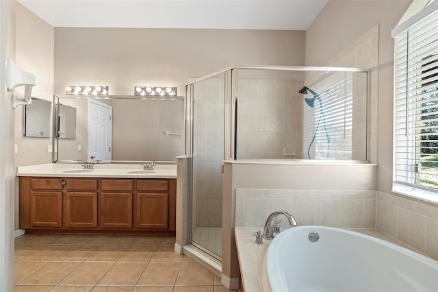 bathroom featuring tile patterned flooring, vanity, and independent shower and bath