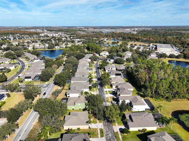 drone / aerial view featuring a water view