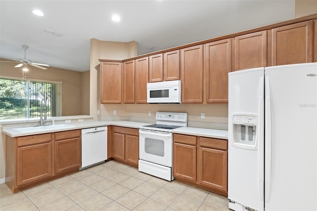 kitchen featuring ceiling fan, white appliances, sink, and light tile patterned floors