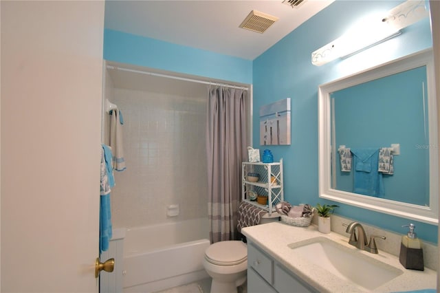 full bathroom with toilet, vanity, and shower / tub combo