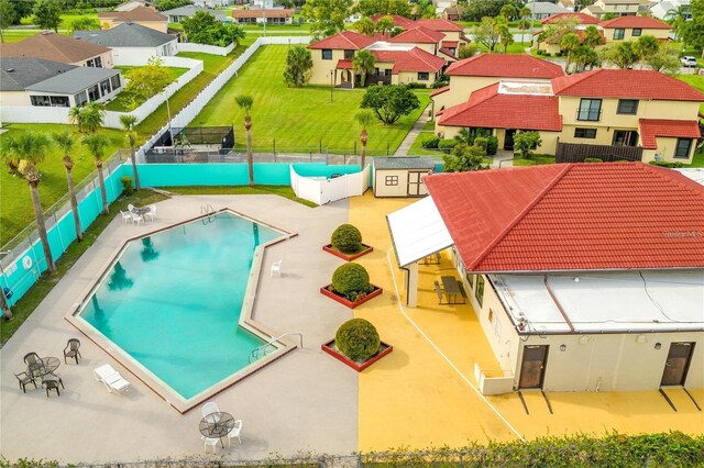 view of swimming pool featuring a patio