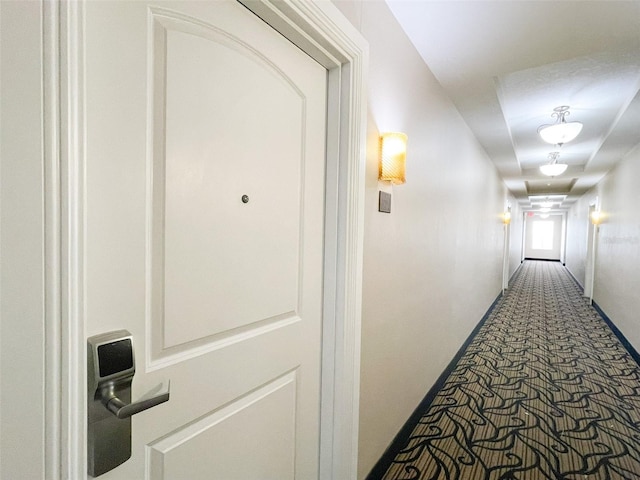 corridor featuring carpet floors