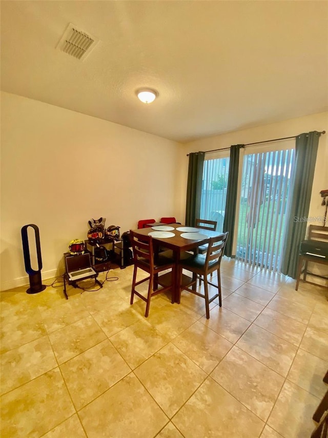 view of tiled dining room