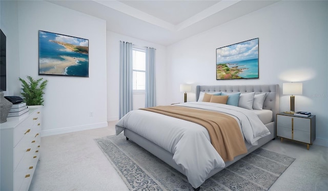 bedroom with a raised ceiling, light carpet, and baseboards