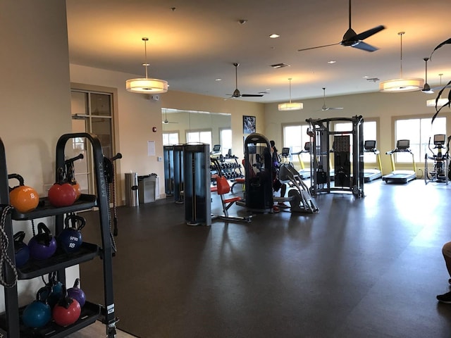 workout area with ceiling fan and visible vents