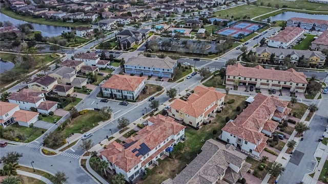 aerial view featuring a water view and a residential view